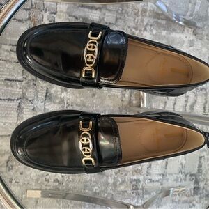 Christy Glossy Black Loafers with Gold Accents